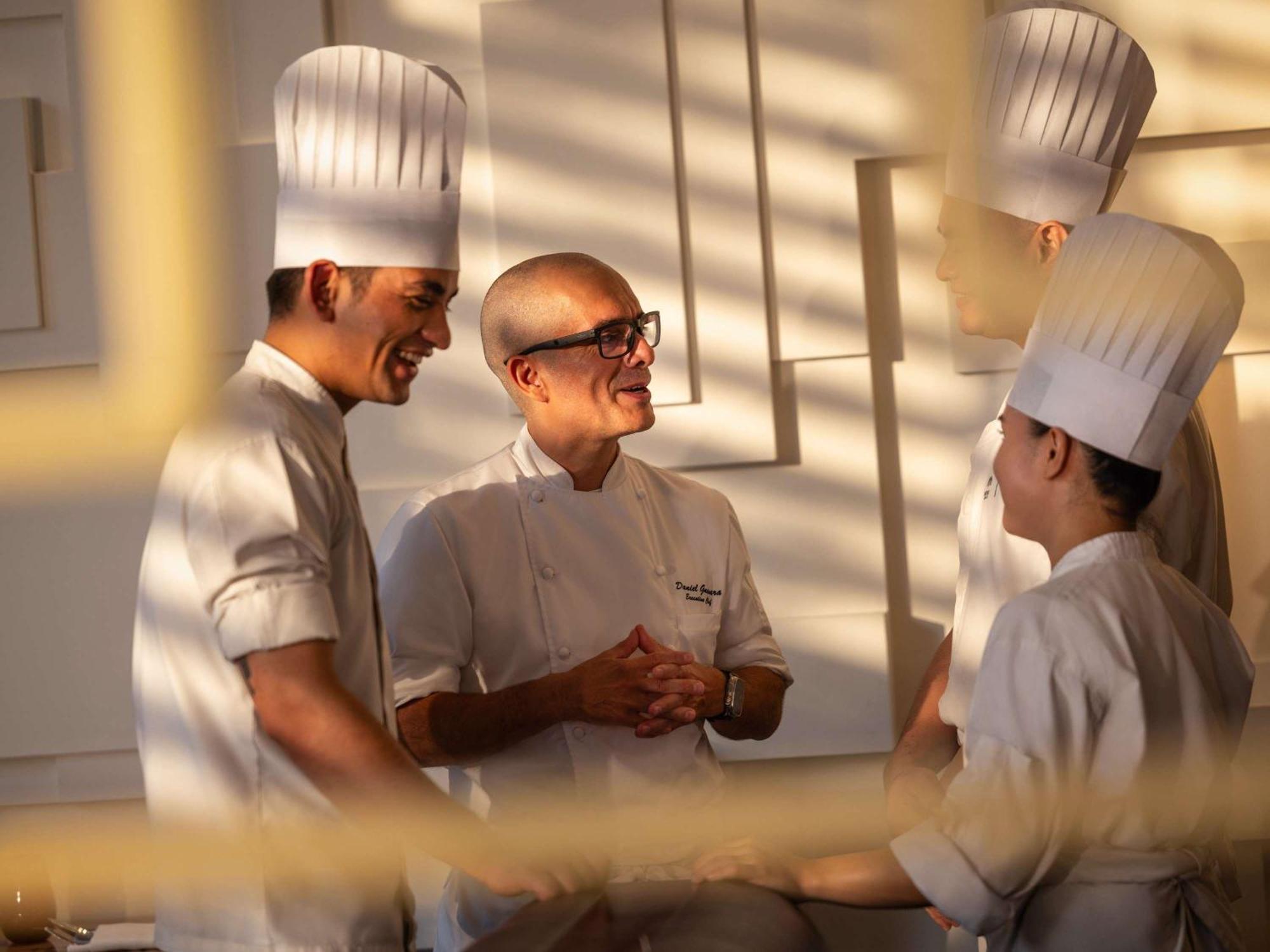 Fairmont Makati Hotel Makati City Exterior photo Chef de cuisine with his sous-chefs